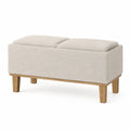 banco con almacenamiento tapizado en tejido beige con tapa abatible y estructura de madera patas de madera diseño moderno sin dimensiones especificadas